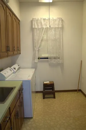 a room with a table and chairs
