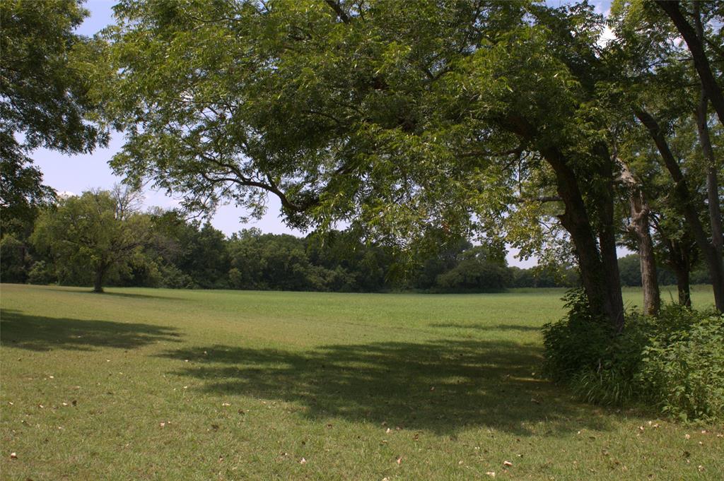 2300 West Main Street Lancaster, TX 75146 - Photo 19 of 22 a view of a field with an trees