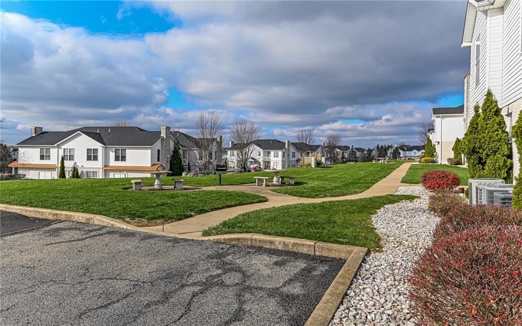 227 Adams Pointe Boulevard, Unit 3 Mars, PA 16046 - Photo 16 of 16 a view of an house with backyard and entertaining space