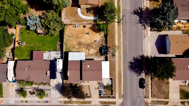 1486 3rd Street Ogden, UT 84404 - Photo 25 of 26 Aerial perspective showcasing a residential street with multiple properties