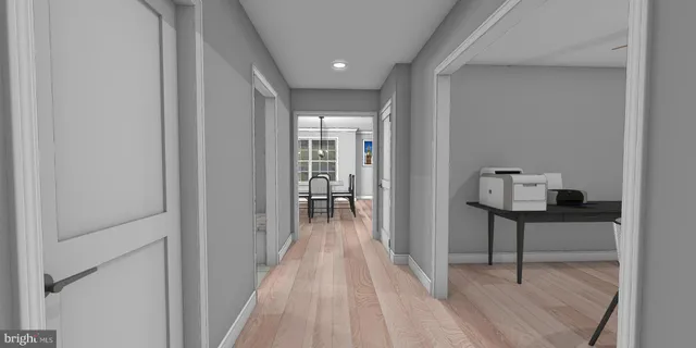 a kitchen with center island and a chandelier