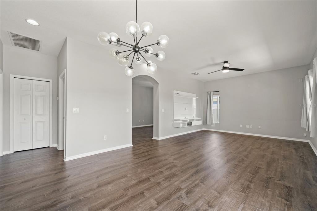10909 Observatory Way Tampa, FL 33647 - Photo 15 of 39 wooden floor in an empty room with a window