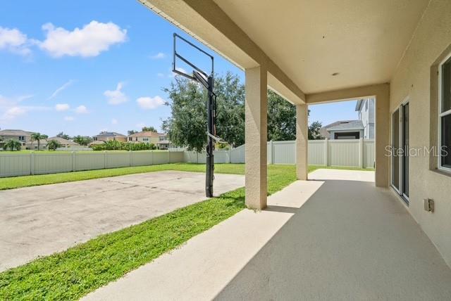 10909 Observatory Way Tampa, FL 33647 - Photo 36 of 39 a view of a house with a yard and sitting area