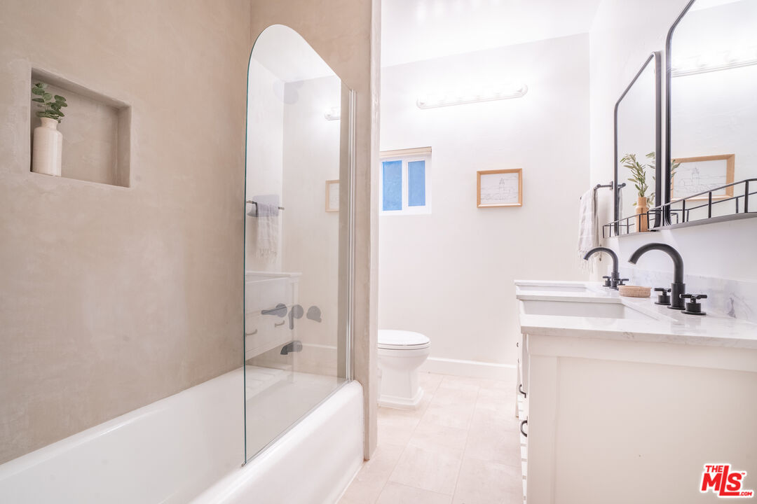 3201 Castera Avenue Glendale, CA 91208 - Photo 11 of 16 a bathroom with a sink and a bathtub