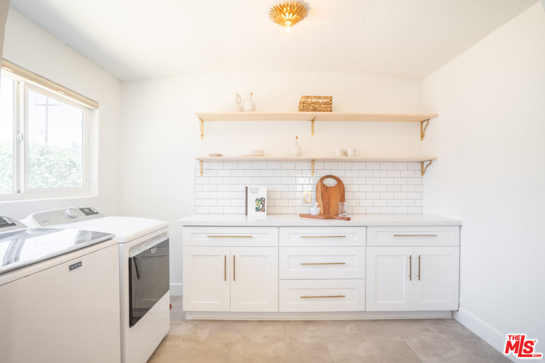 3201 Castera Avenue Glendale, CA 91208 - Photo 12 of 16 a utility room with cabinets