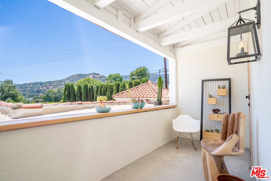 3201 Castera Avenue Glendale, CA 91208 - Photo 13 of 16 a bathroom with a toilet sink and mirror