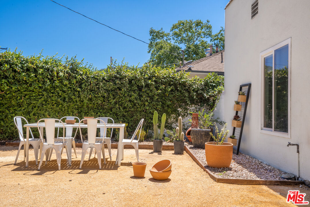 3201 Castera Avenue Glendale, CA 91208 - Photo 14 of 16 a view of a house with backyard sitting area and tub