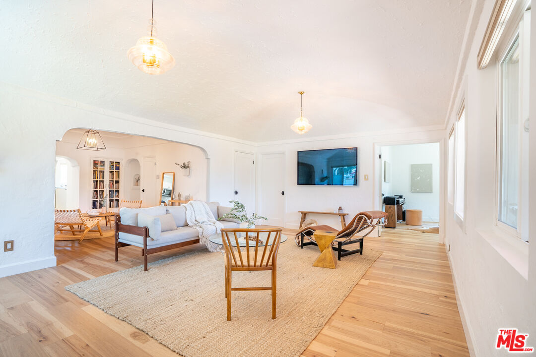 3201 Castera Avenue Glendale, CA 91208 - Photo 3 of 16 a living room with furniture and a flat screen tv
