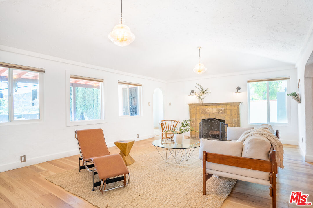 3201 Castera Avenue Glendale, CA 91208 - Photo 4 of 16 a living room with furniture and a fireplace