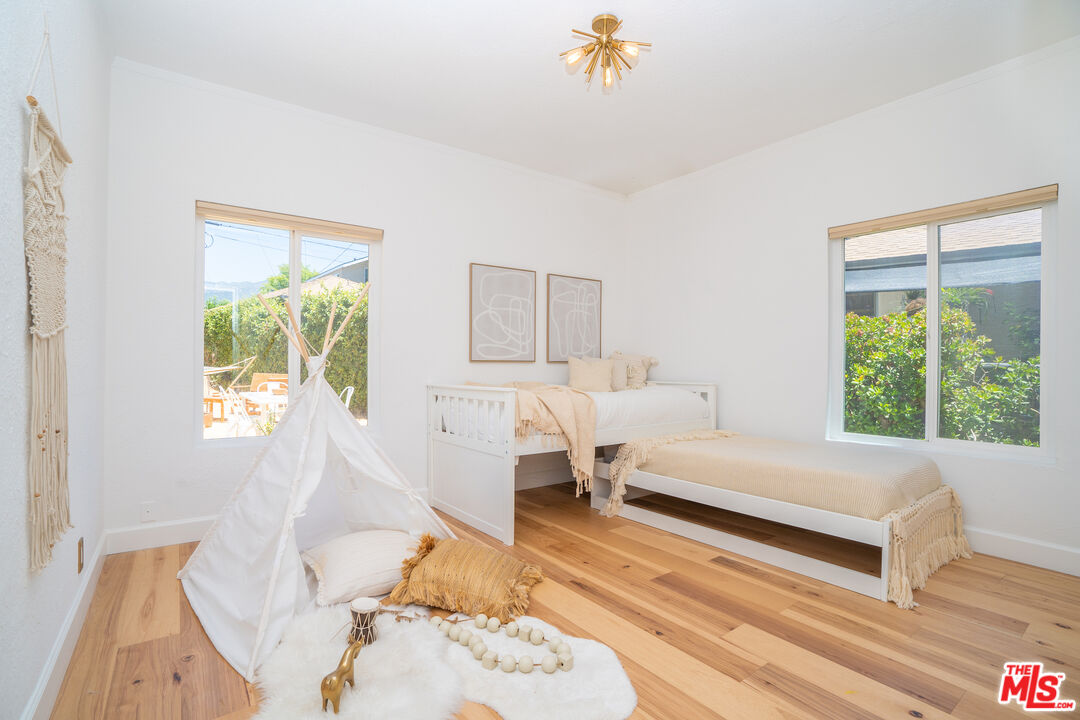 3201 Castera Avenue Glendale, CA 91208 - Photo 9 of 16 a bedroom with a bed and a window