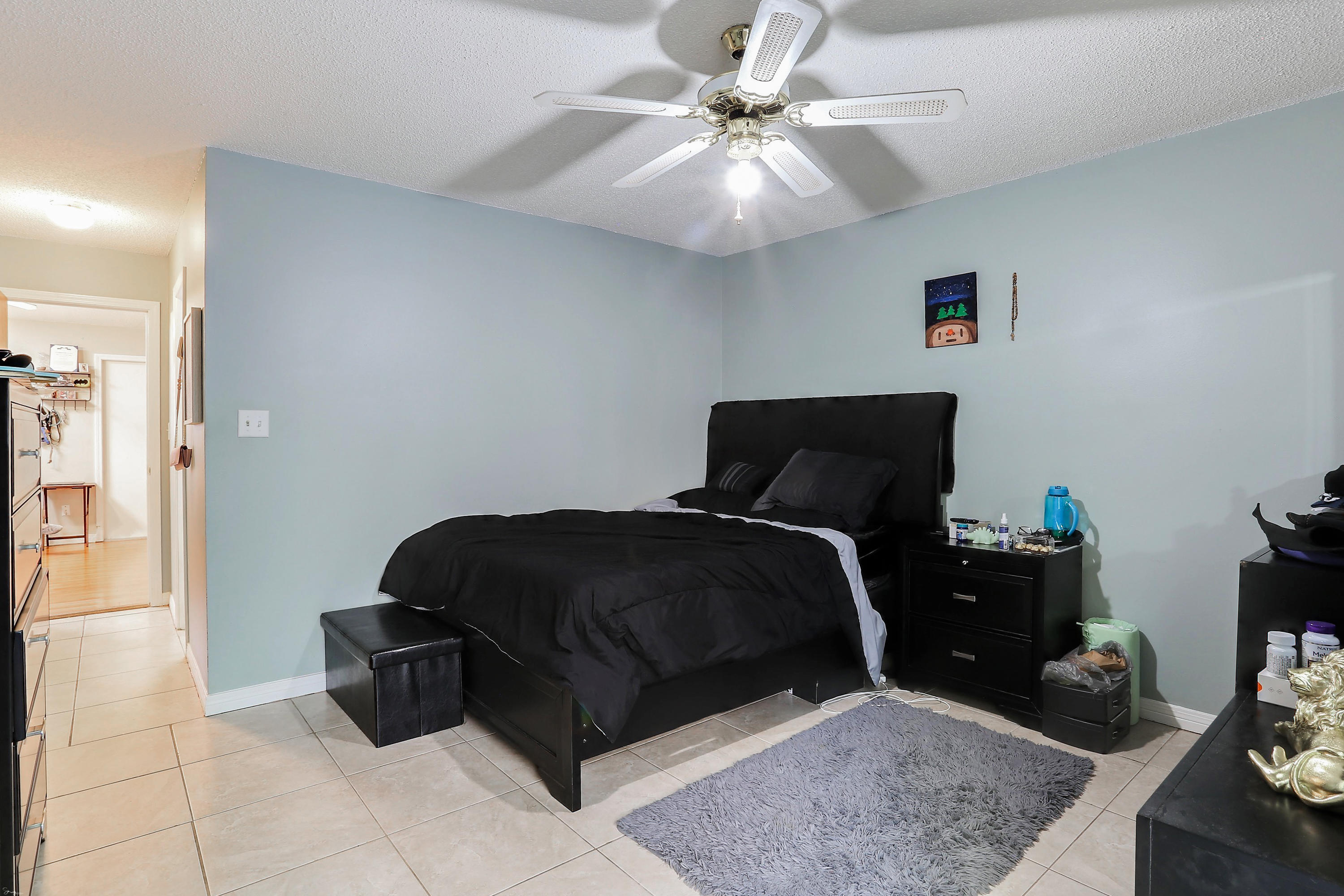 9 Falcon Ridge Lane, Unit 9 Fort Walton Beach, FL 32547 - Photo 12 of 23 a bedroom with a bed and window