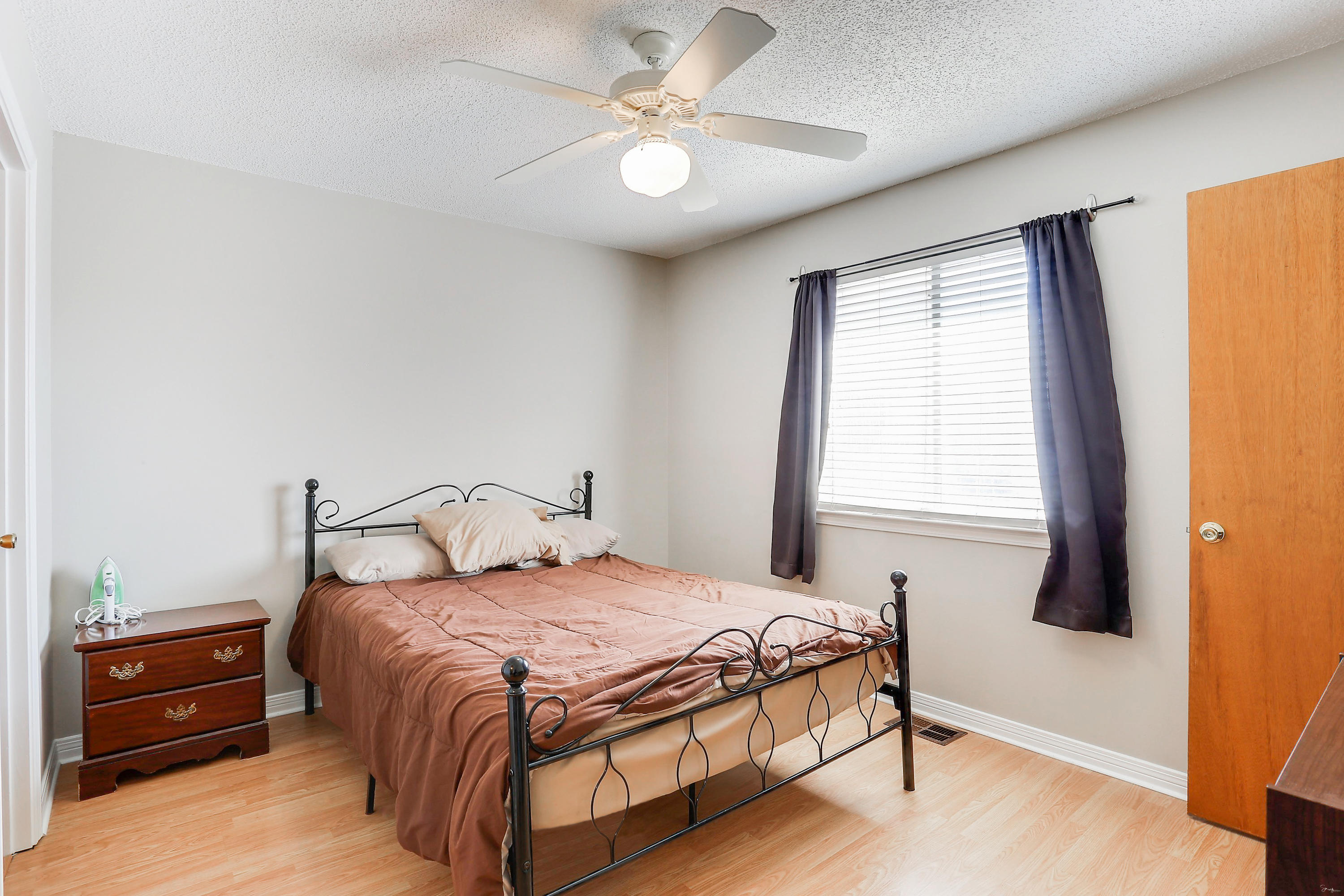 9 Falcon Ridge Lane, Unit 9 Fort Walton Beach, FL 32547 - Photo 16 of 23 a bedroom with a bed and a window