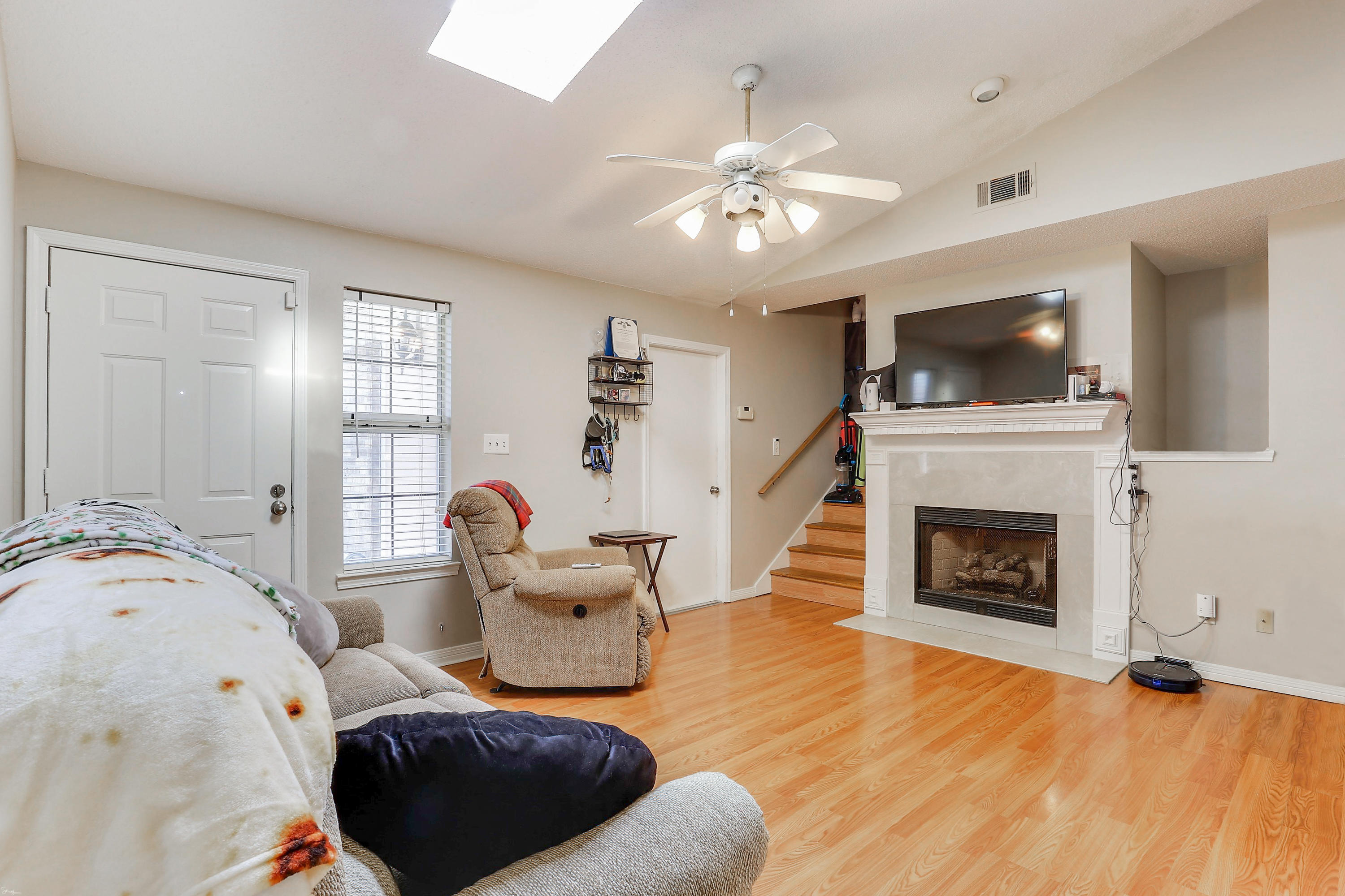 9 Falcon Ridge Lane, Unit 9 Fort Walton Beach, FL 32547 - Photo 3 of 23 a living room with furniture and a fireplace