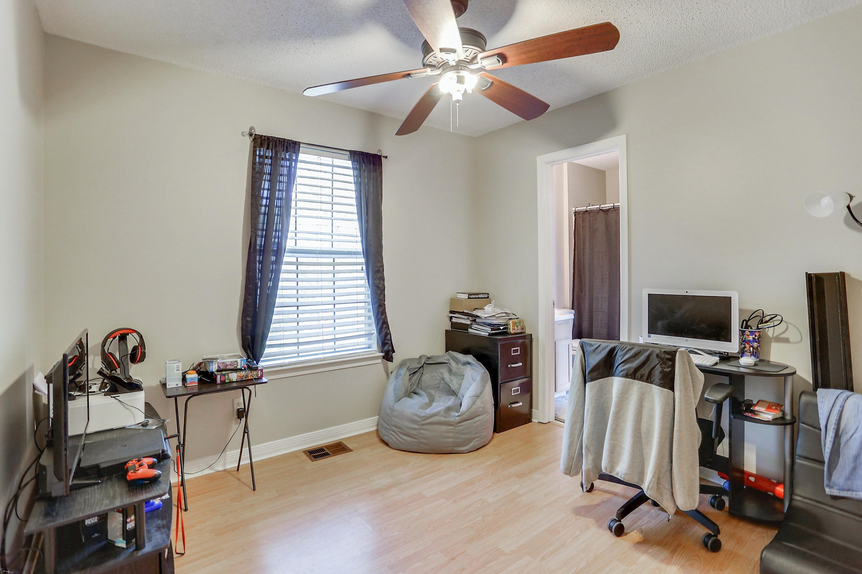 9 Falcon Ridge Lane, Unit 9 Fort Walton Beach, FL 32547 - Photo 21 of 23 a view of a workspace with furniture and a window