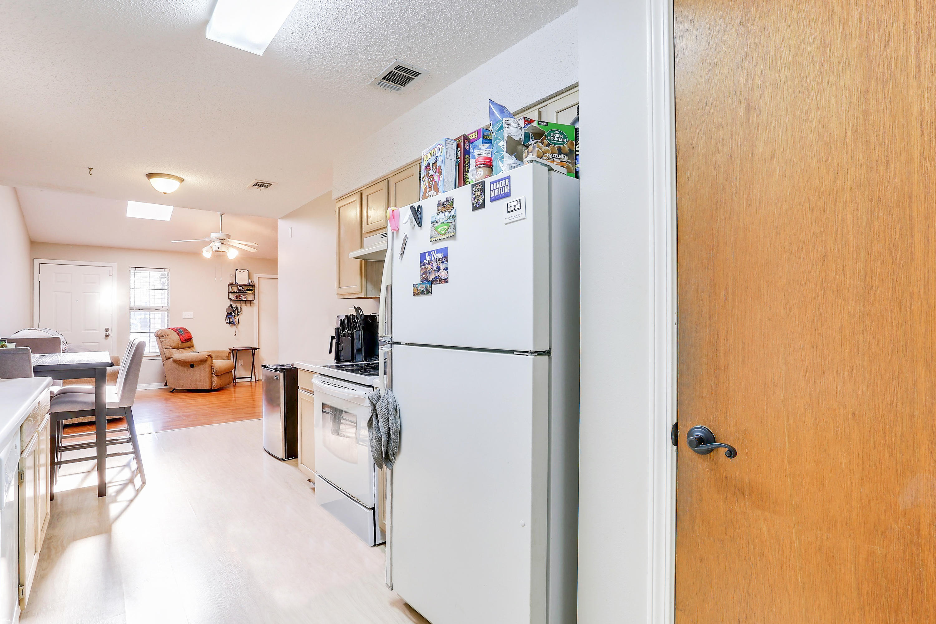 9 Falcon Ridge Lane, Unit 9 Fort Walton Beach, FL 32547 - Photo 9 of 23 a white refrigerator freezer sitting in a kitchen