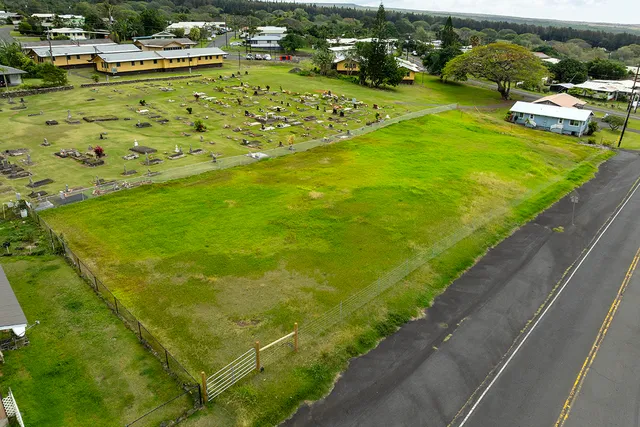 a view of a lake with a house in the background