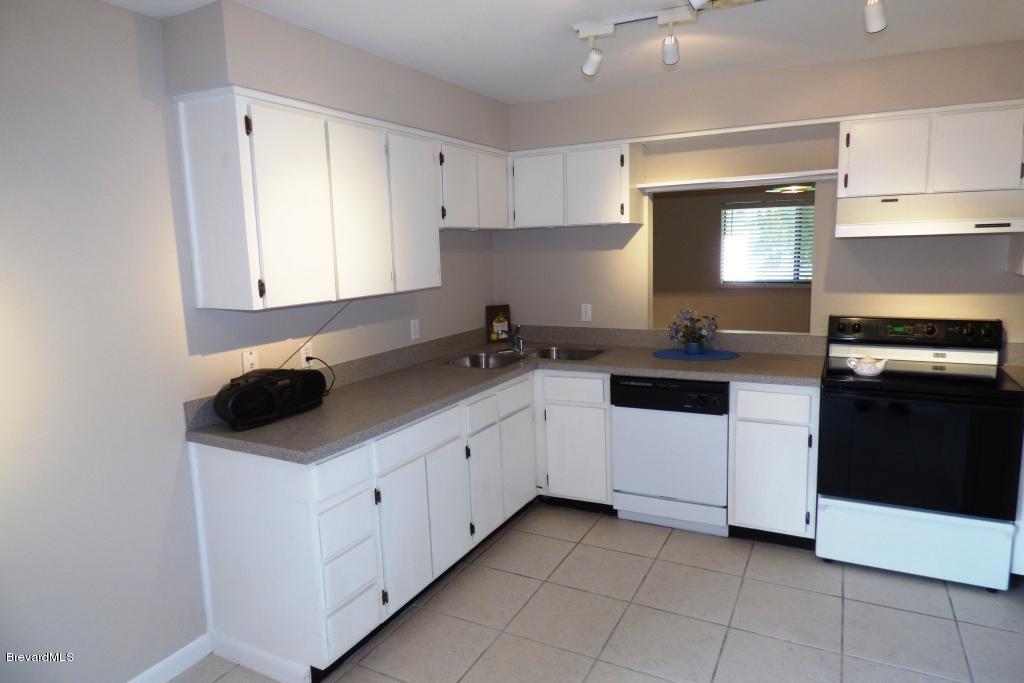 413 Myrtlewood Road Melbourne, FL 32940 - Photo 22 of 38 Plenty of Cabinets
