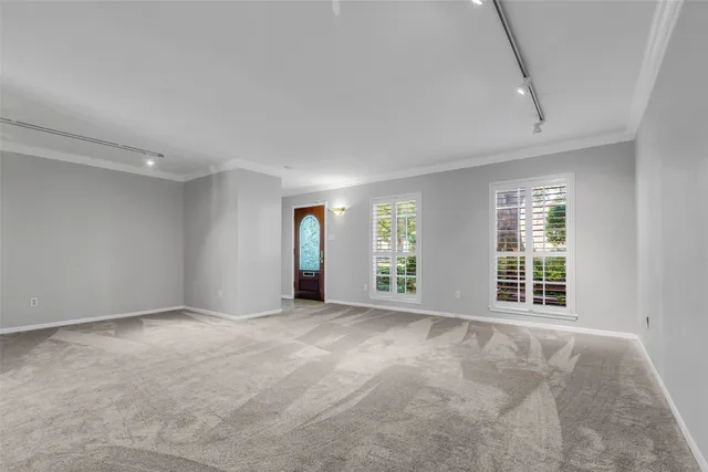 an empty room with windows