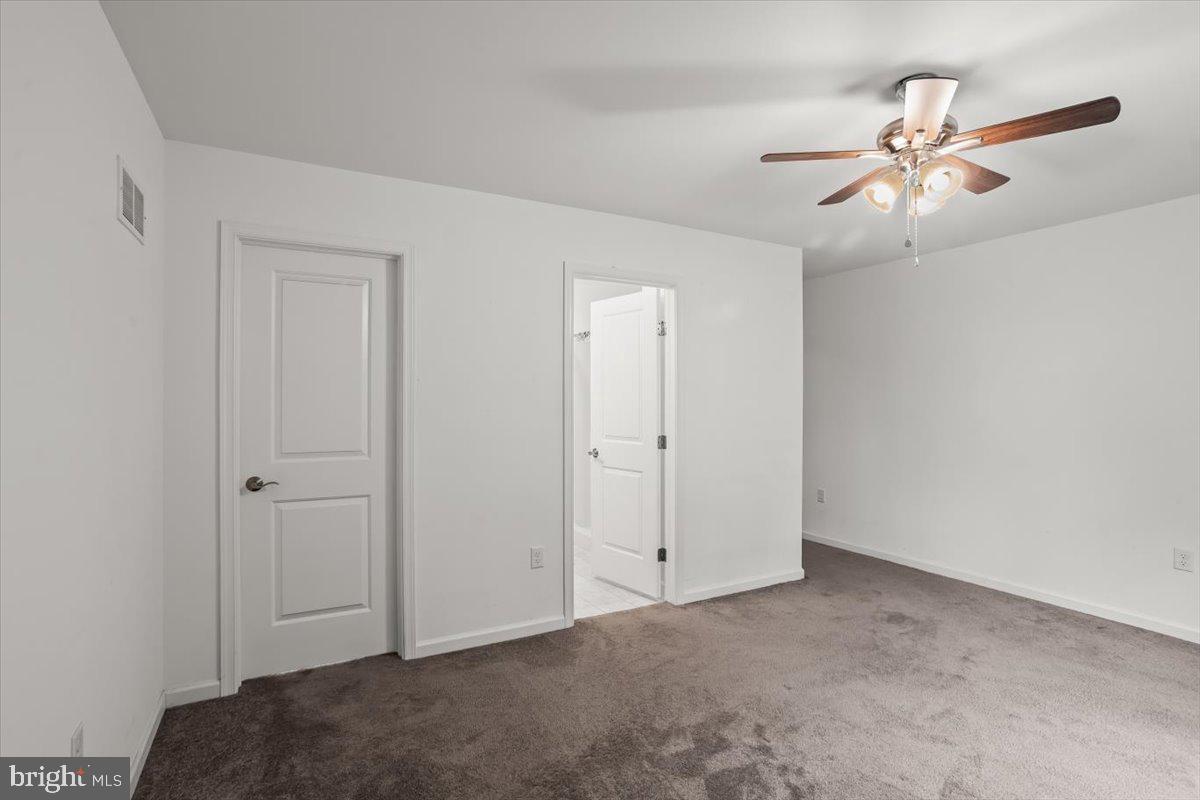 205 East Main Street Brownstown, PA 17508 - Photo 12 of 27 a view of an empty room and chandelier fan