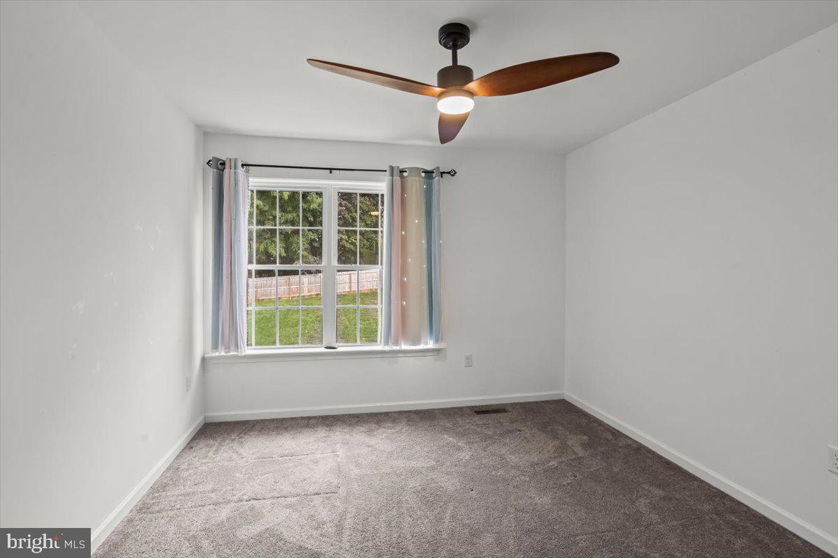 205 East Main Street Brownstown, PA 17508 - Photo 17 of 27 an empty room with a window