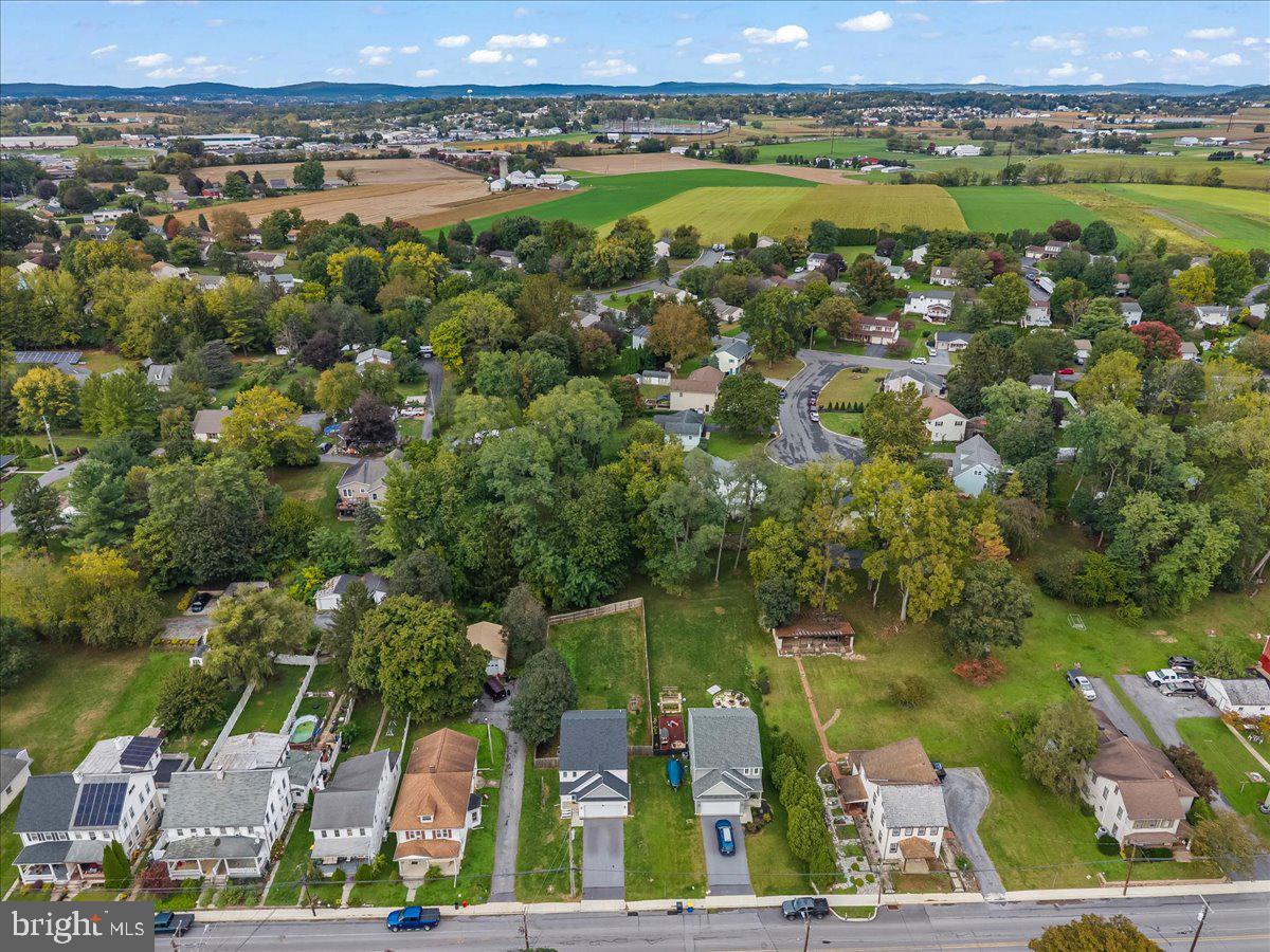 205 East Main Street Brownstown, PA 17508 - Photo 22 of 27 an aerial view of river residential houses with outdoor space and river