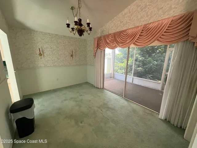 a view of entryway with a front door