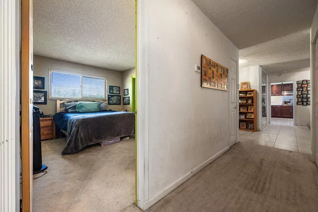 a bathroom with a toilet a sink and a mirror