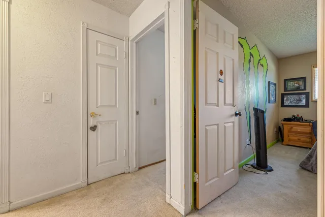 a bathroom with a bathtub and a window
