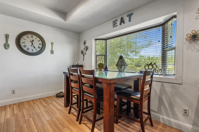 a view of a backyard with a patio