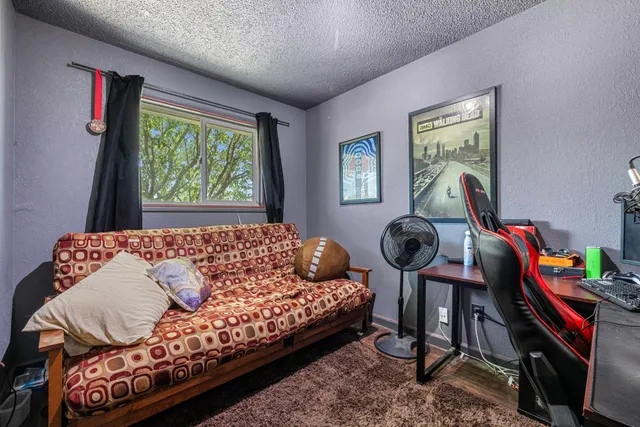 a kitchen with stainless steel appliances a refrigerator and a stove