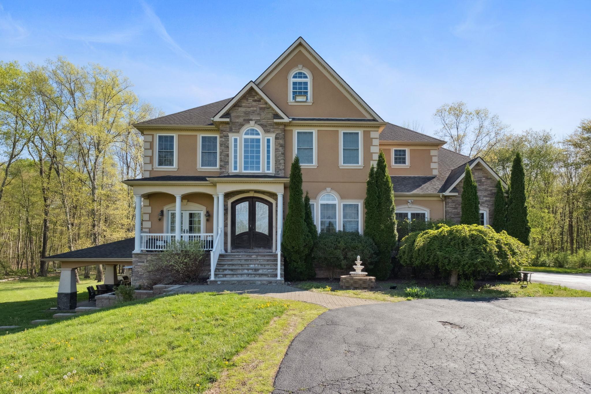 10 Todd Hill Road Poughkeepsie, NY 12603 - Photo 1 of 1 a front view of a house with garden