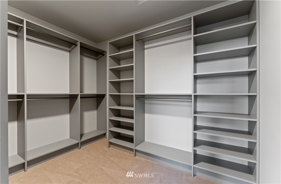 4558 22nd Avenue Southwest Seattle, WA 98106 - Photo 34 of 38 a view of walk in closet with empty racks