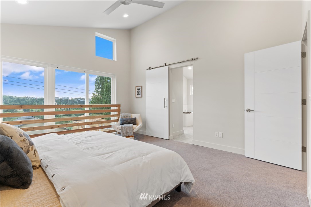 4558 22nd Avenue Southwest Seattle, WA 98106 - Photo 38 of 38 a bedroom with a bed and a window