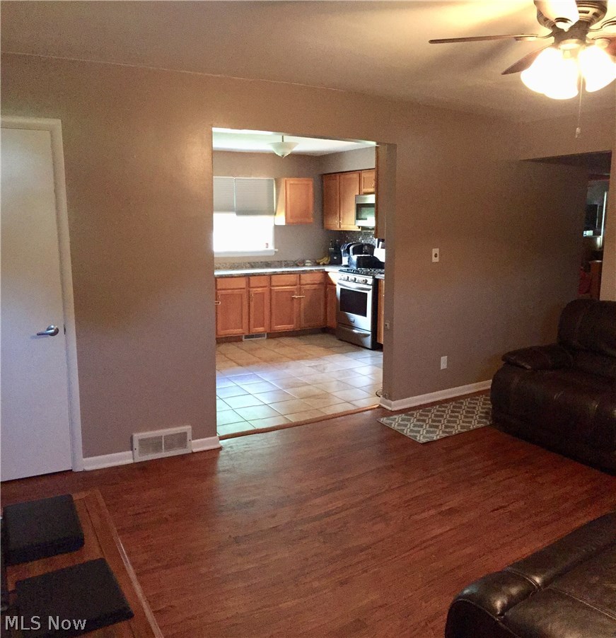 5955 Wynnbrook Road Southwest Canton, OH 44706 - Photo 15 of 26 View of living room open to kitchen