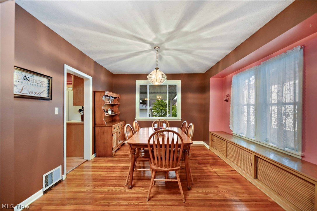 7914 Jameson Road Parma, OH 44129 - Photo 18 of 35 Dining Room has been freshly painted! Replacement windows throughout the home!