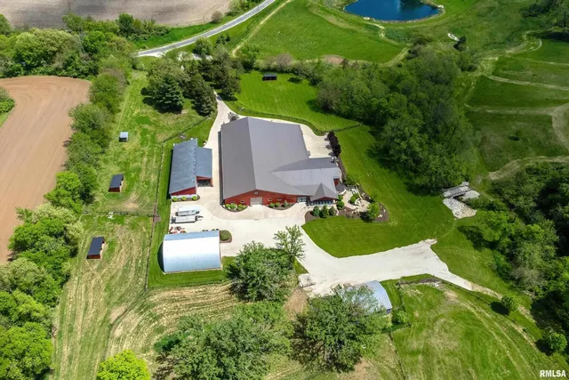 an aerial view of a house with a garden