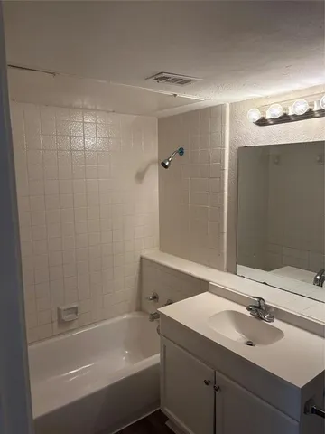 a view of a small space with wooden floor and closet