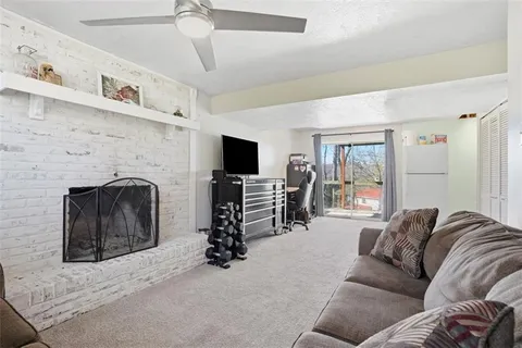 a workspace with furniture and a window