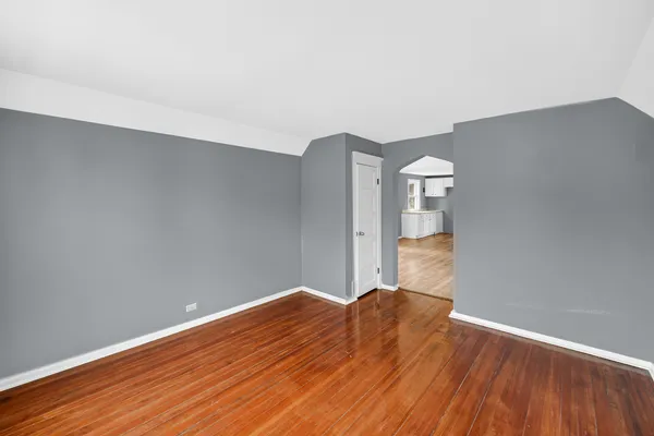 a view of a big room with wooden floor