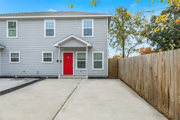 a view of a house with a garage
