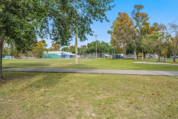 a view of a golf course with a trees