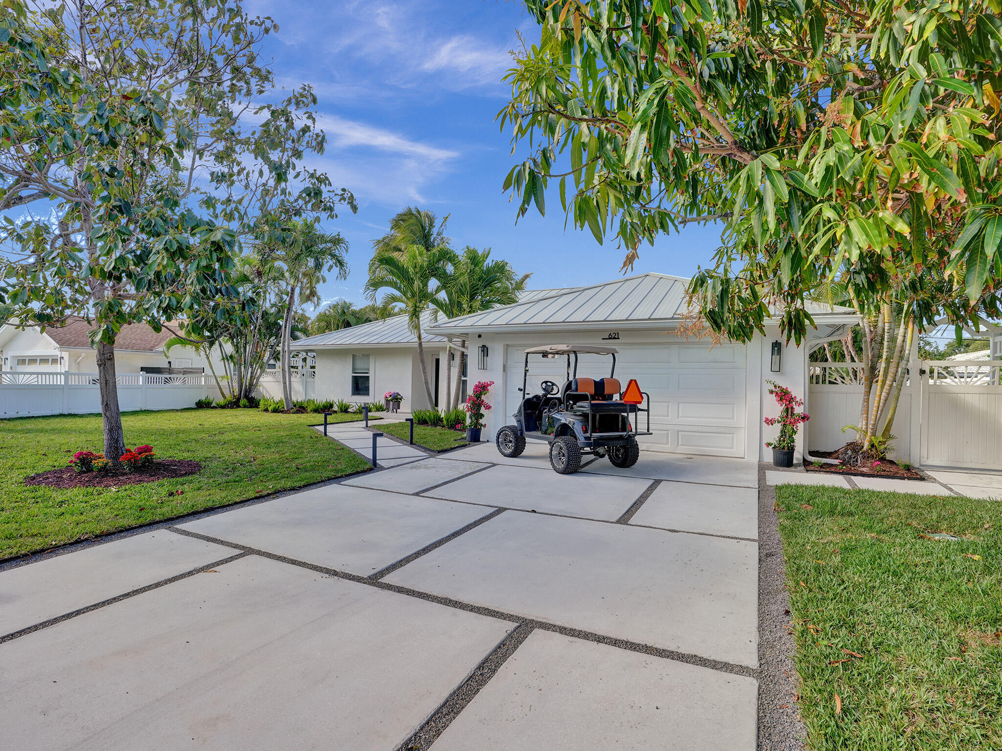 621 Enfield Road Delray Beach, FL 33444 - Photo 27 of 31 Driveway & Golf Cart