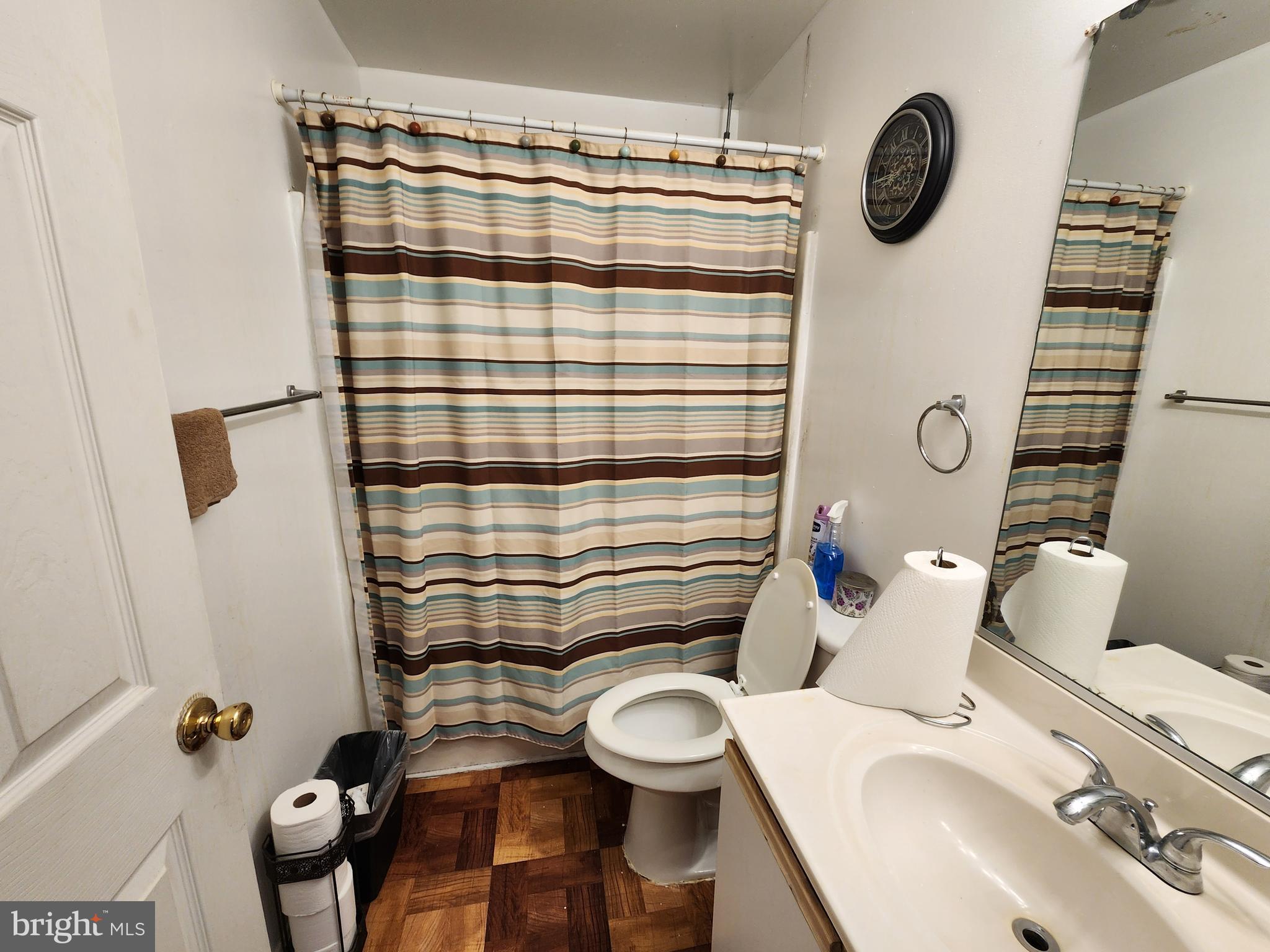 3901 Princely Way Baltimore, MD 21208 - Photo 18 of 23 a bathroom with a sink toilet and shower
