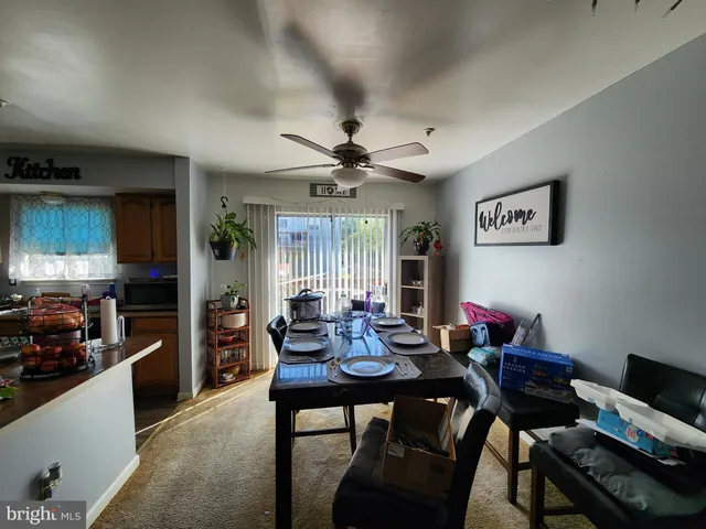 a view of a dining room with furniture