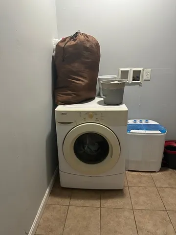 a utility room with a washer and dryer