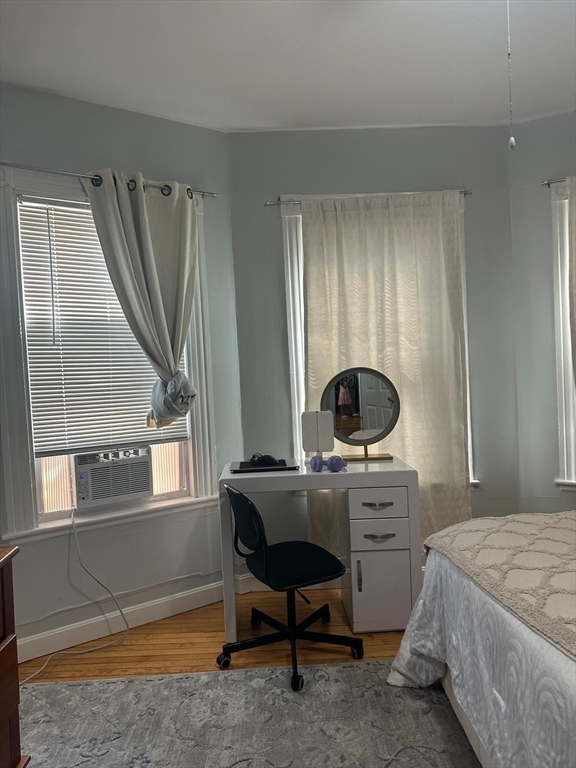 82 Fox Street Worcester, MA 01604 - Photo 21 of 38 a bedroom with a bed and a window