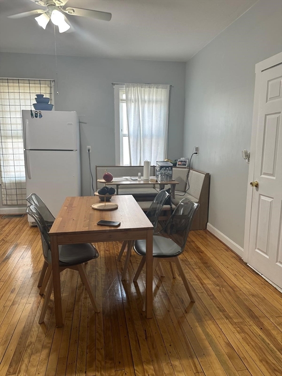 82 Fox Street Worcester, MA 01604 - Photo 23 of 38 a view of a dining room with furniture and wooden floor