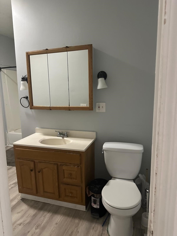 82 Fox Street Worcester, MA 01604 - Photo 32 of 38 a bathroom with a toilet sink and mirror