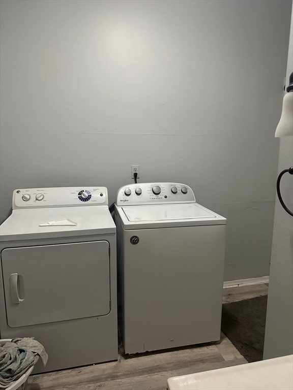 82 Fox Street Worcester, MA 01604 - Photo 33 of 38 a utility room with dryer and washer