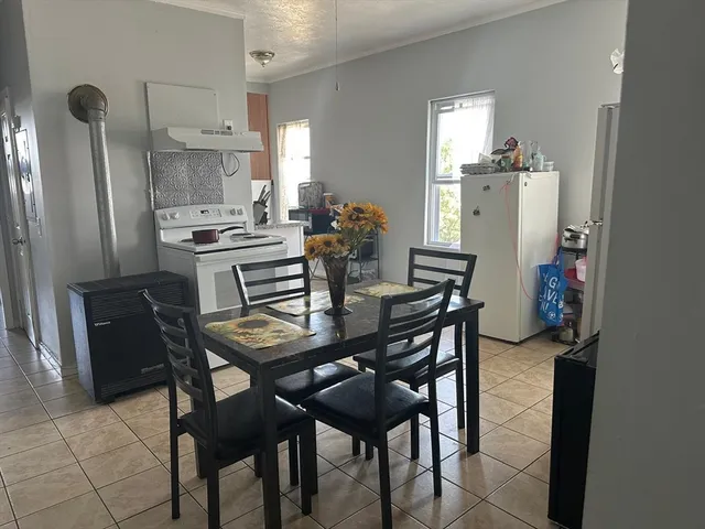 a view of a dining room with furniture